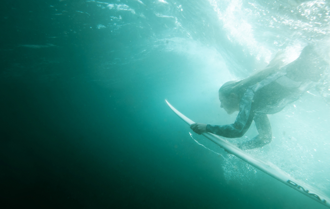 surfer under water